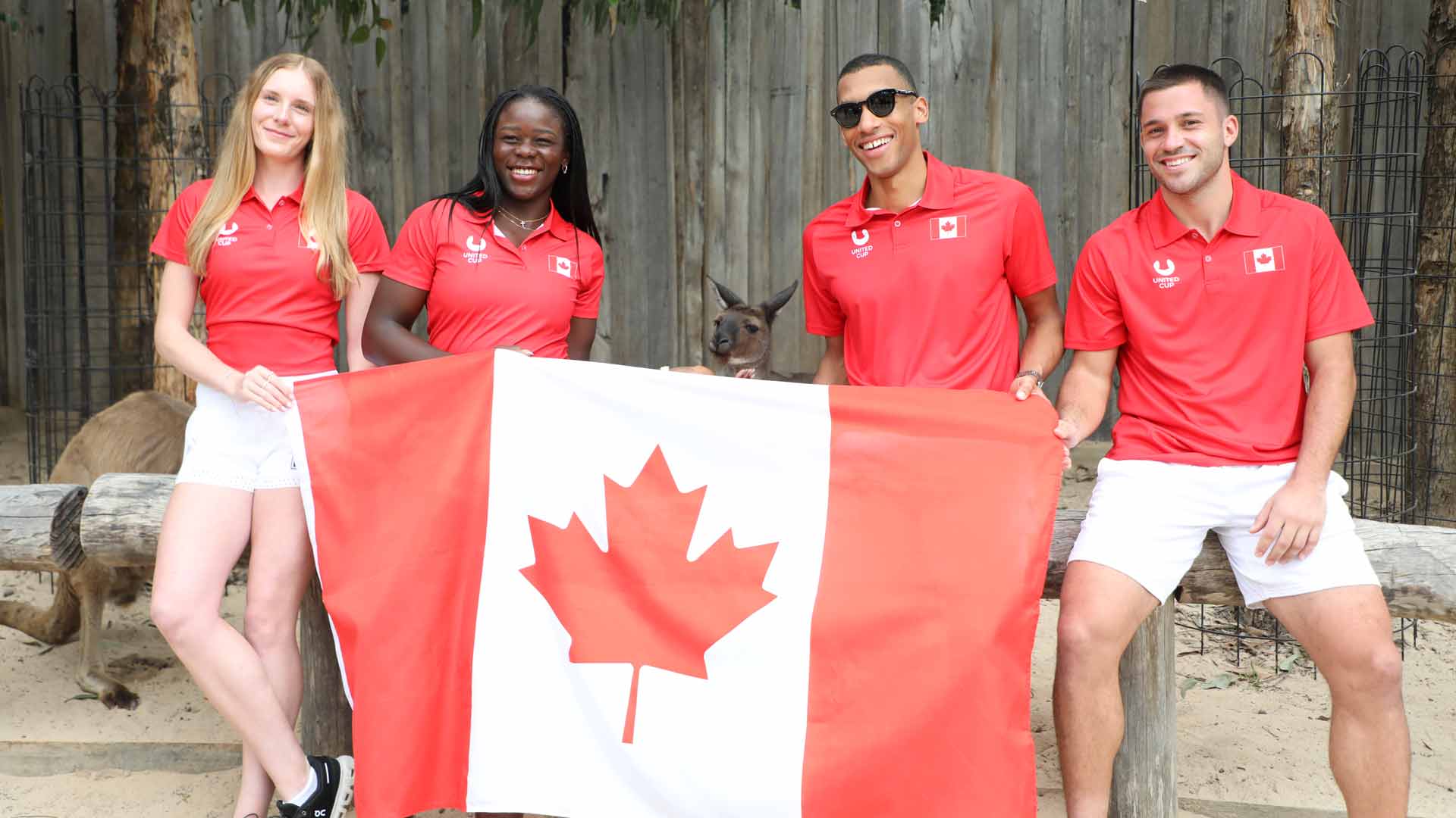 Team Canada with a kangaroo at the Sydney zoo.
