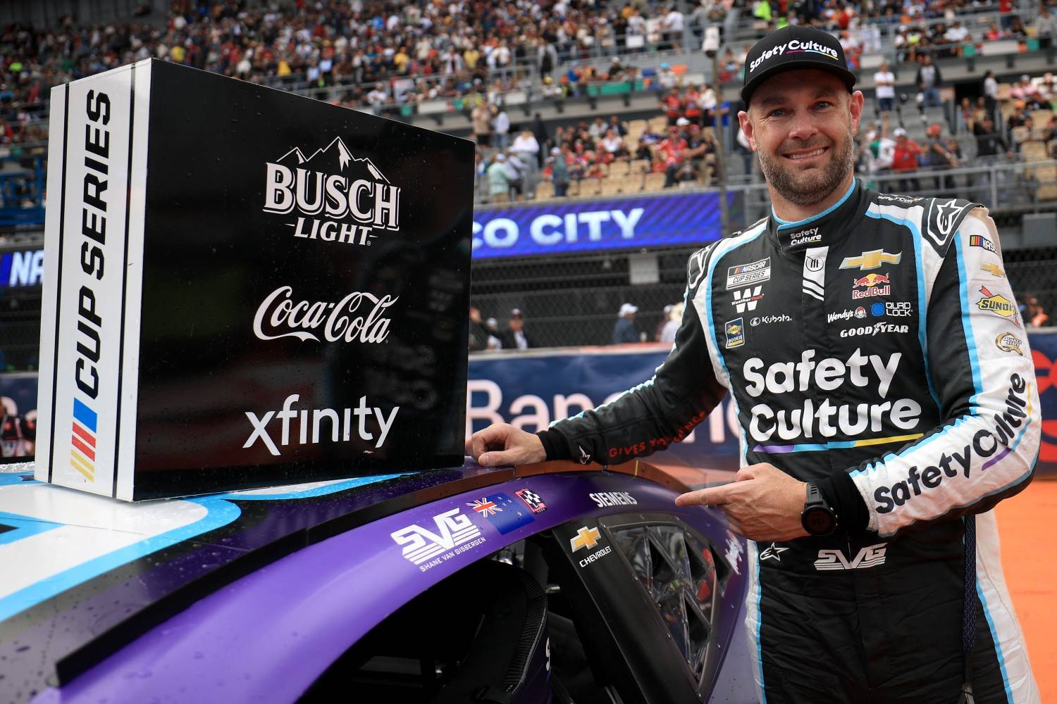 Shane Van Gisbergen, driver of the #88 Safety Culture Chevrolet, poses with the winner sticker on his car in victory lane after winning the NASCAR Cup Series Viva Mexico 250 at Autodromo Hermanos Rodriguez on June 15, 2025 in Mexico City, Mexico. (Photo by Chris Graythen/Getty Images)