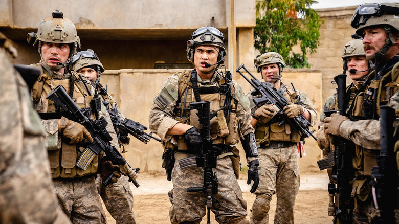 Charles Melton as Jake leads Alpha 2 into battle in Warfare