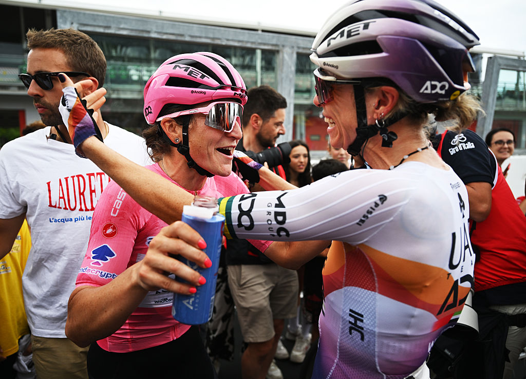 IMOLA, ITALY - JULY 13: (L-R) Overall race winner Elisa Longo Borghini of Italy - Pink Leader Jersey and Brodie Chapman of Australia and UAE Team ADQ react after the 36th Giro d'Italia Women 2025, Stage 8 a 134km stage from Forli to Imola / #UCIWWT / on July 13, 2025 in Imola, Italy. (Photo by Luc Claessen/Getty Images)