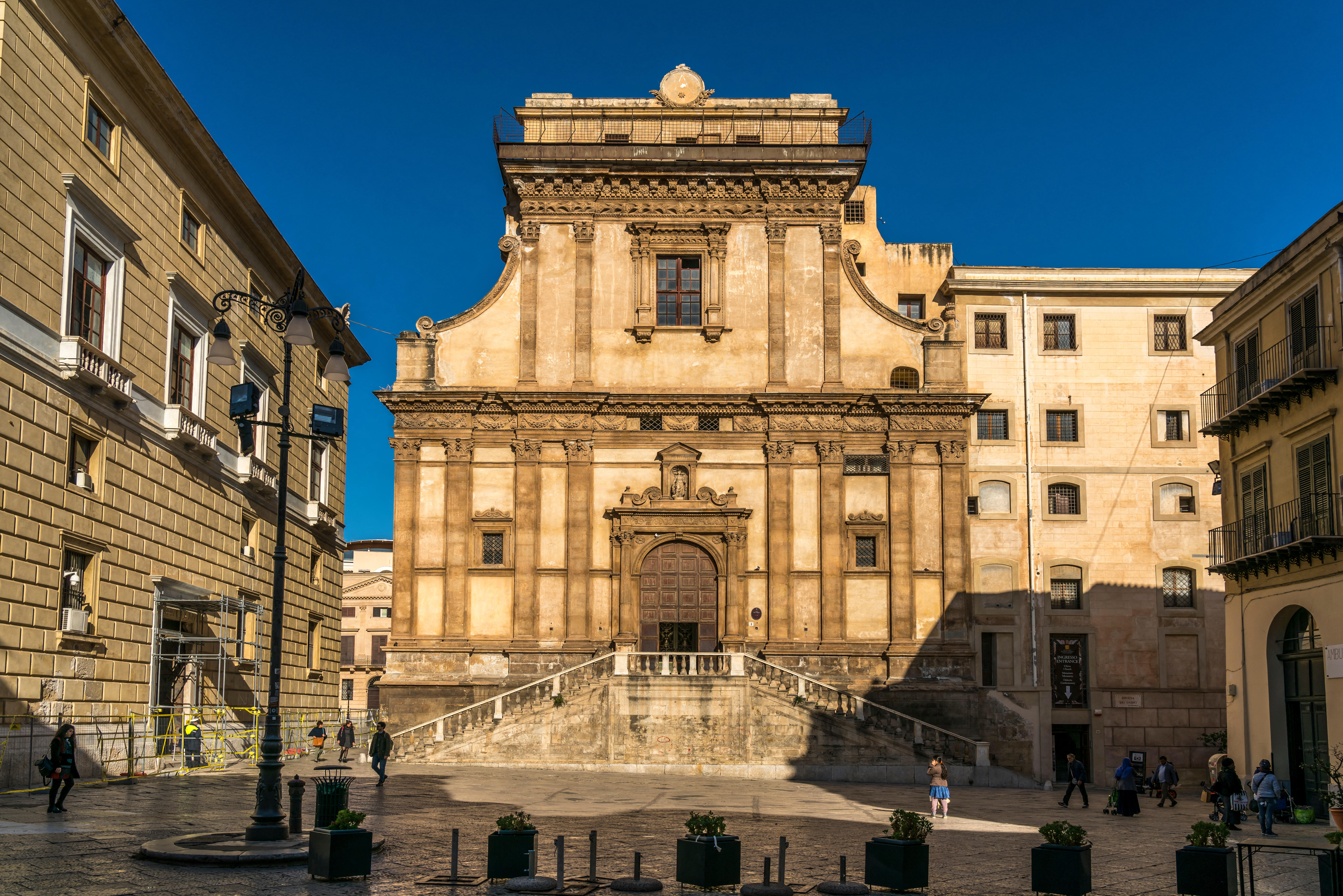 The Chiesa di Santa Caterina d'Alessandria in Palermo, Sicily, Italy, a large Baroque church with a grand facade and a wide staircase leading to its entrance.
