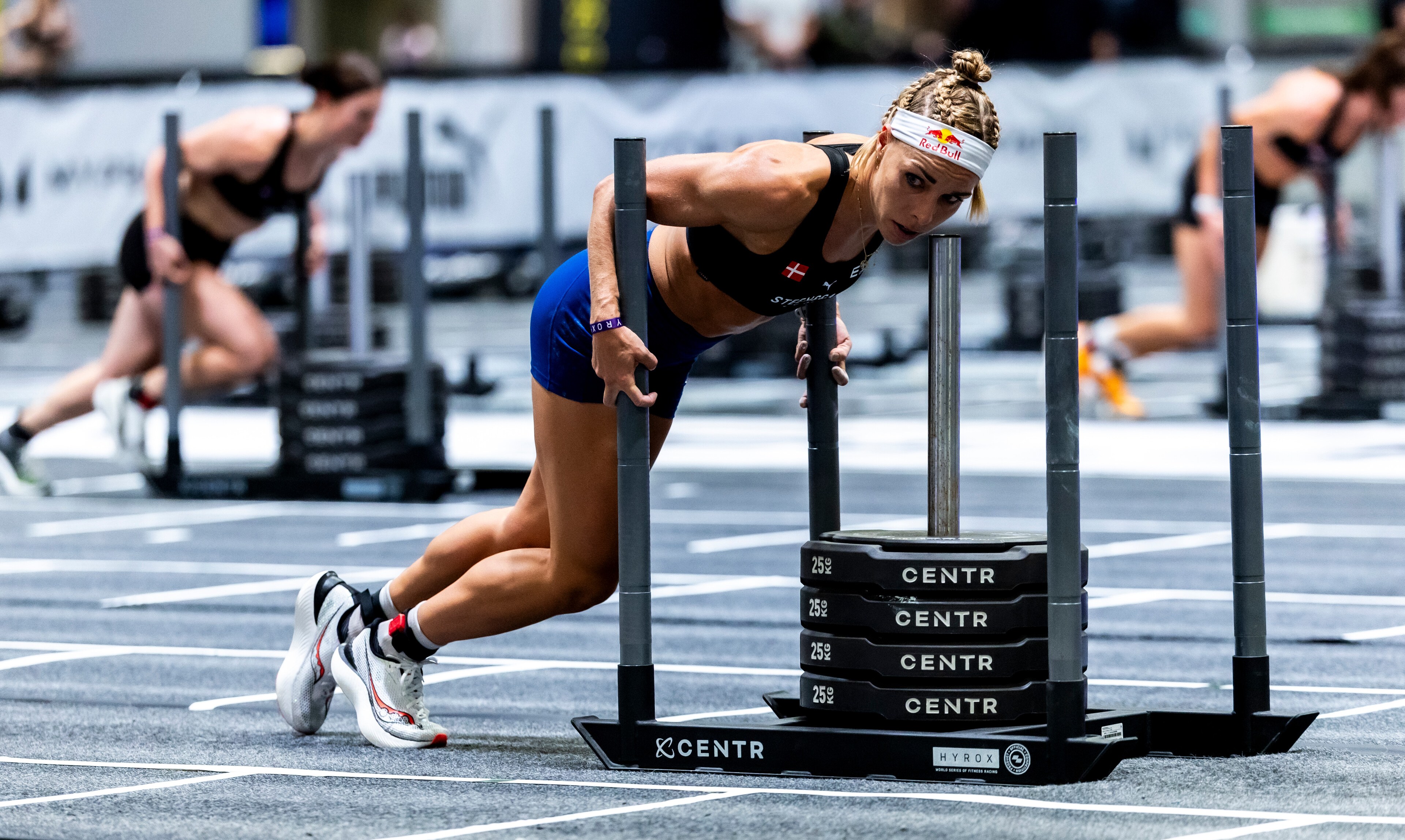 Joanna Wietrzyk pushing a weighted sled during the Elite 15 at the Hyrox Major in Hong Kong.
