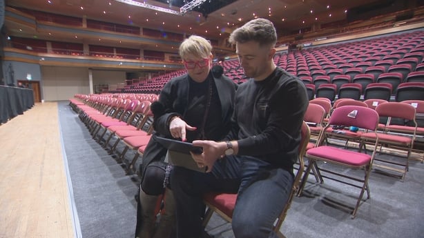 Fiona Crowley and Brendan Muller watching Jessie Buckley collect her Golden Globe