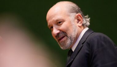 U.S. Trade Minister Howard Lutnick walks down the stairs after a meeting during the Annual Meeting of the World Economic Forum in Davos, Switzerland on Wednesday, Jan. 21, 2026. (AP Photo/Markus Schreiber)