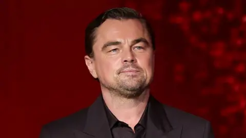 Getty Images Leonardo DiCaprio in a black suit