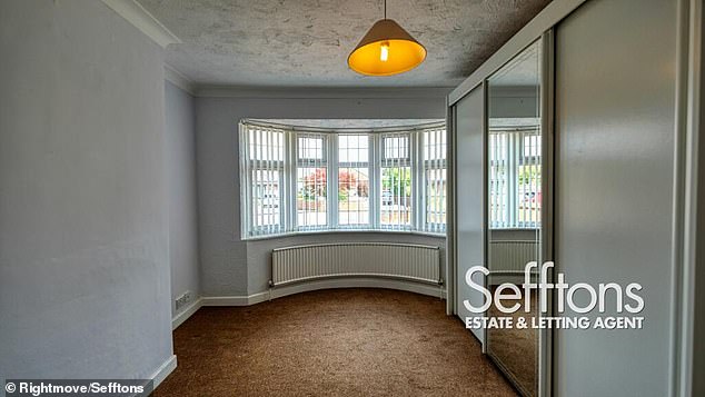 The room as it appeared in an older property listing - with rather more subdued lighting. It also appears smaller than the previous image suggested
