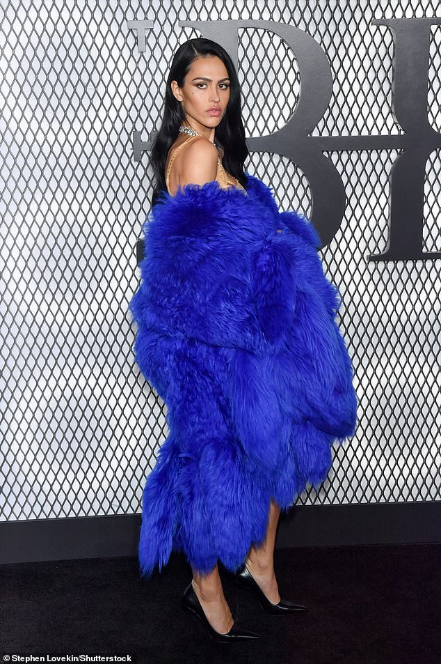 Gray added height to her runway-worthy frame with a pair of black heels