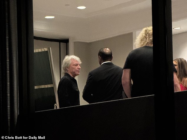 Exclusive Daily Mail photos reveal the recently-minted couple with rock legend Jon Bon Jovi (far left), who performed an acoustic set before the 300 VIP guests