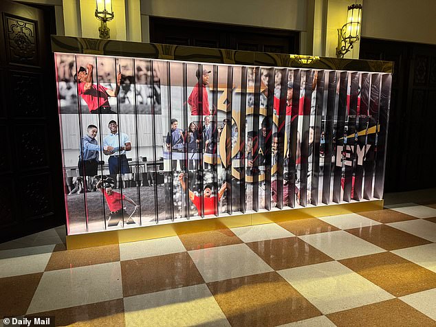 A Tiger Woods billboard was among several eye-catching visuals at the party