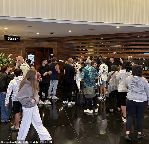 The US tennis star was mobbed while dining out at upmarket Japanese fusion restaurant Nobu in Melbourne