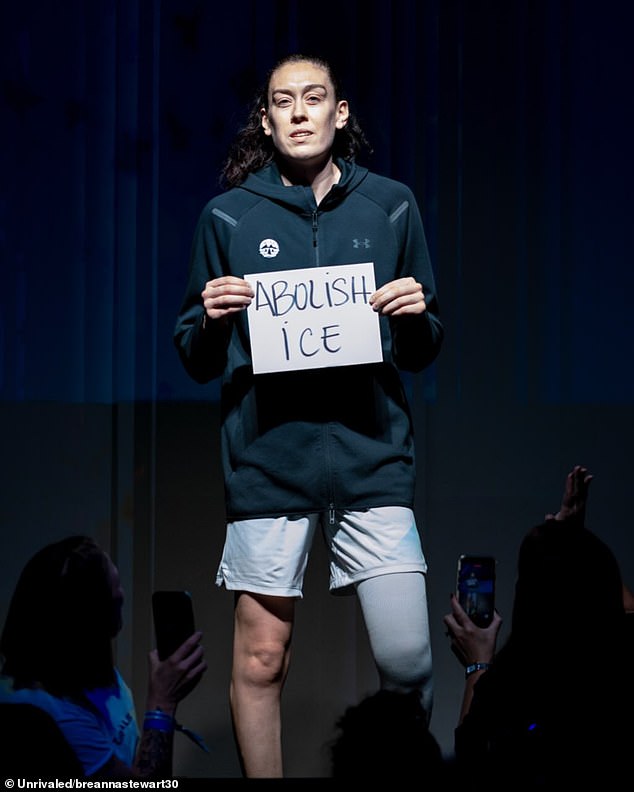 Future Basketball Hall of Famer Breanna Stewart raised an 'Abolish ICE' sign while being introduced before an Unrivaled competition in Florida on Sunday