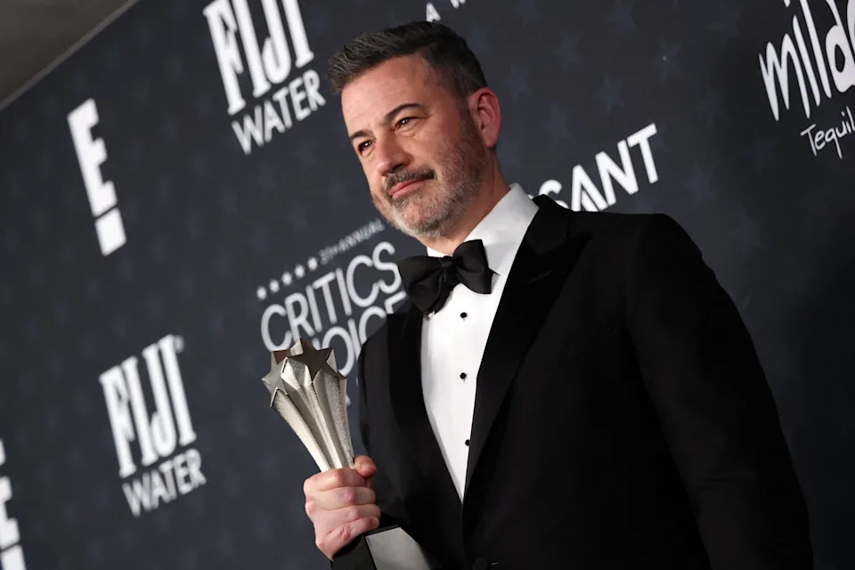 TV host Jimmy Kimmel poses in the press room with the Best Talk Show award for "Jimmy Kimmel Live!" during the 31st Annual Critics Choice Awards at Barker Hangar in Santa Monica, California, on January 4, 2026. (Photo by Michael Tran / AFP via Getty Images)