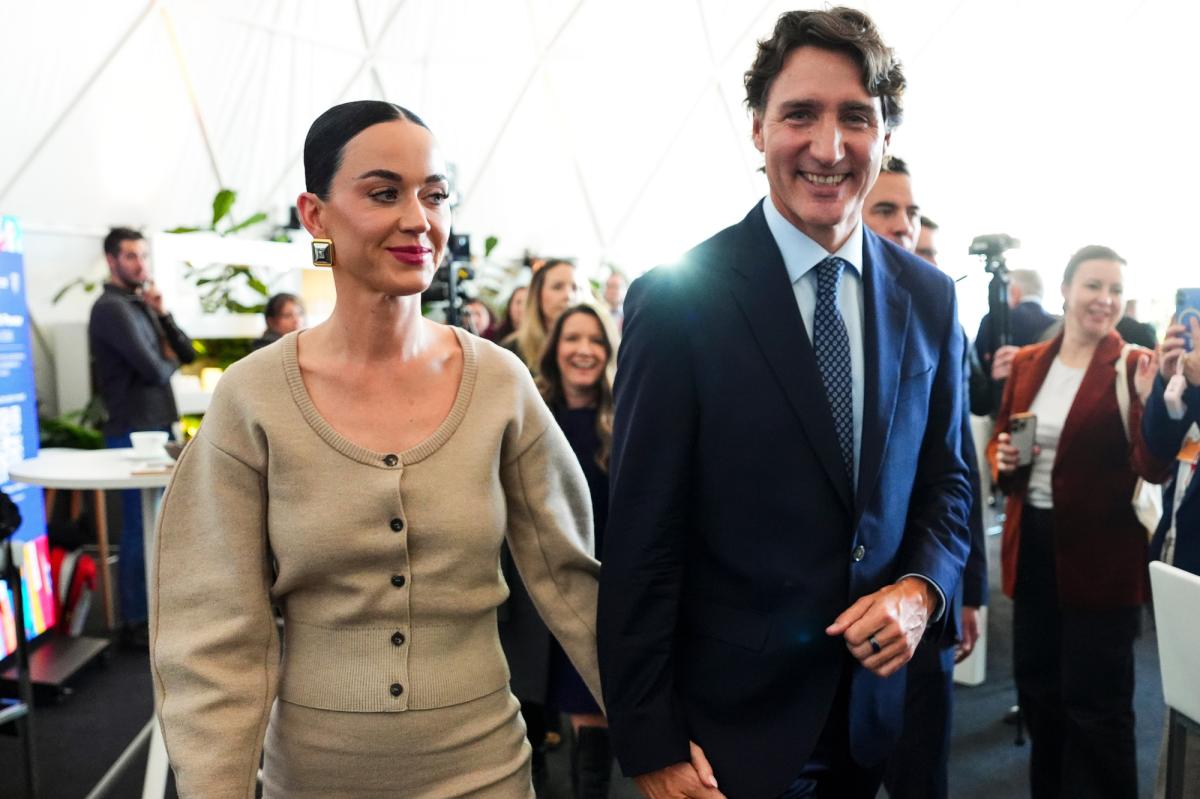 Katy Perry swaps her signature wild style for conservative chic with Justin Trudeau in Davos