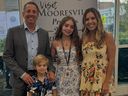Retired NASCAR driver Greg Biffle with wife, Cristina, and children Ryder and Emma during an event earlier this year. 