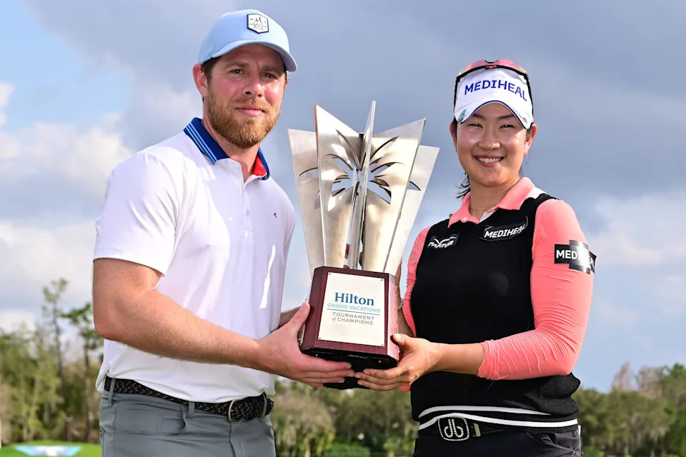 ORLANDO, Florida – Former NHL player Joe Pavelski and A Lim Kim of South Korea pose with the trophy after the final round of the Hilton Grand Vacations Tournament of Champions 2025 at Lake Nona Golf & Country Club on February 02, 2025 in Orlando, Florida.