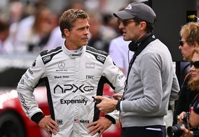 Brad Pitt and director Joseph Kosinski on the set of 'F1: The Movie' at Britain's Silverstone Circuit in Northampton, England.