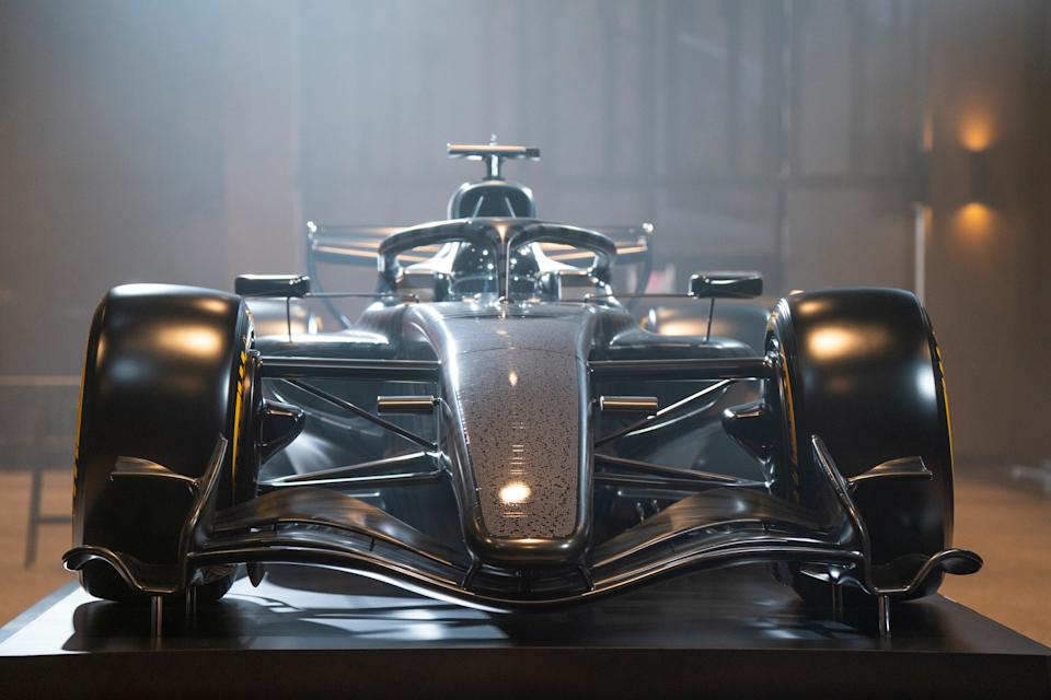 A reveal of the Cadillac Formula 1 race car takes place during the Detroit Free Press Breakfast Club that hosted General Motors President Mark Reuss and Penske Corp. Chairman Roger Penske on Tuesday, Jan. 13, 2026 at the new Hudson's office space in Detroit.