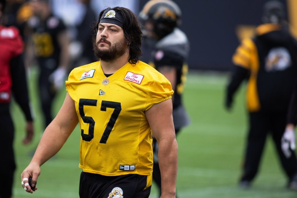 Hamilton Tiger-Cats Brandon Revenberg takes part in a practice at Tim Hortons Field during the CFL