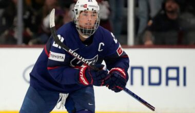 FILE - United States forward Hilary Knight skates to the bench to celebrate her goal against Canada during the first period of a rivalry series women