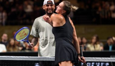 Nick Kyrgios, left, and Aryna Sabalenka interact at the net during their Battle of the Sexes match, in Dubai, United Arab Emirates, Sunday Dec. 28, 2025. (Christopher Pike/Pool Photo via AP)