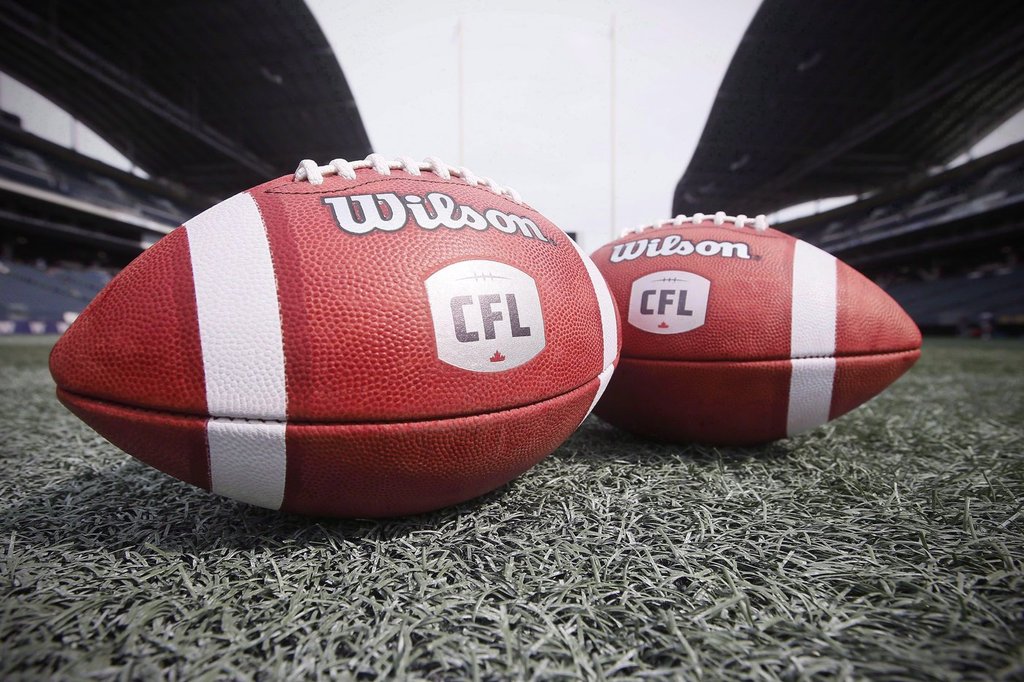 New CFL balls are photographed at the Winnipeg Blue Bombers stadium in Winnipeg, Thursday, May 24, 2018. THE CANADIAN PRESS/John Woods
