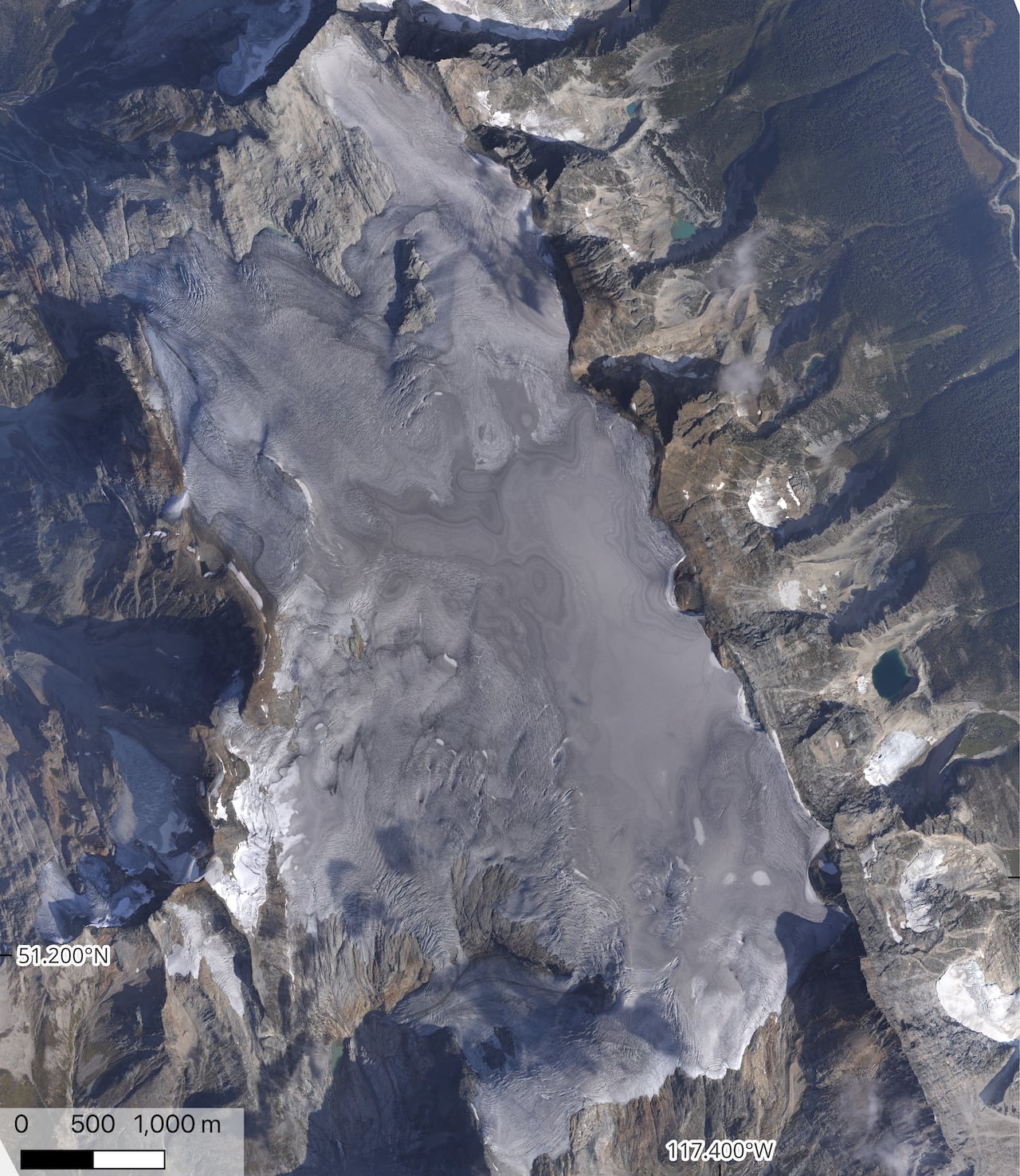 image of Illecillewaet Glacier on 18 September, 2025 shows the lack of clean snow and overall dark surface of the snow and ice.