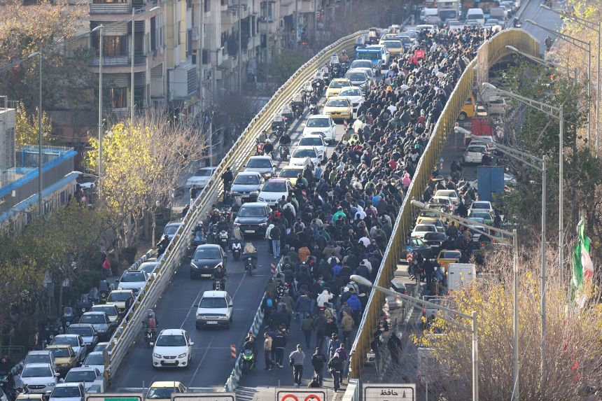 Protesters march in downtown Tehran, Iran, on December 29, 2025.