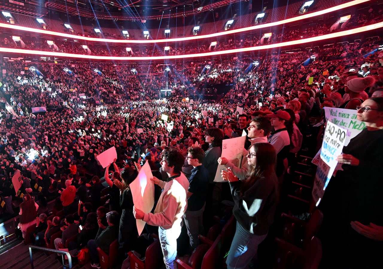 wide shot of arena filled with people