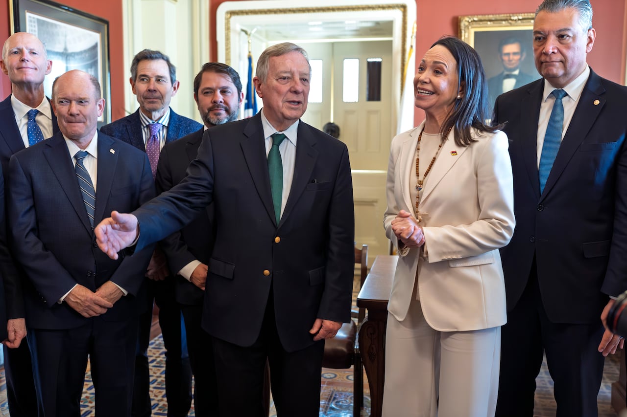 Venezeulan opposition leader Maria Corina Machado being greeted by a group of U.S. senators