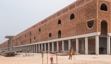 concrete canopies and brick walls form central market in congo