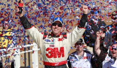 FILE - Greg Biffle celebrates in victory lane after winning the NASCAR Sprint Cup Series auto race at Kansas Speedway on Sunday, Oct. 3, 2010, in Kansas City, Kan. (AP Photo/Orlin Wagner, File)