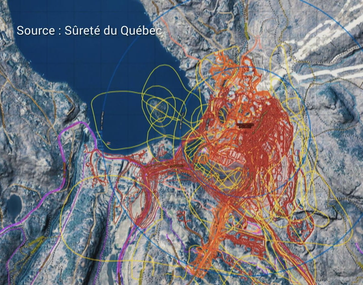 An aerial map of the Mont Tremblant ski resort and surrounding area with colour-coded lines drawn across it.