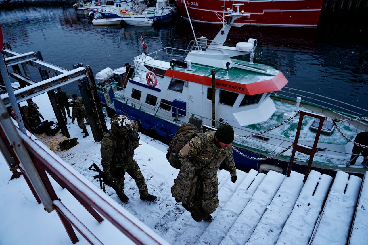 Danish soldiers disembark at the port in Nuuk, Greenland