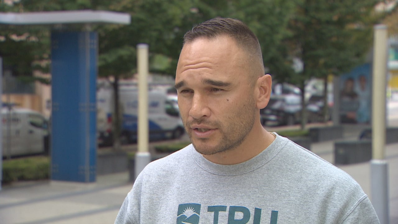 Willie Sellars, the Chief Williams Lake First Nation, is seen outdoors. He is an Indigenous man wearing a grey sweater.