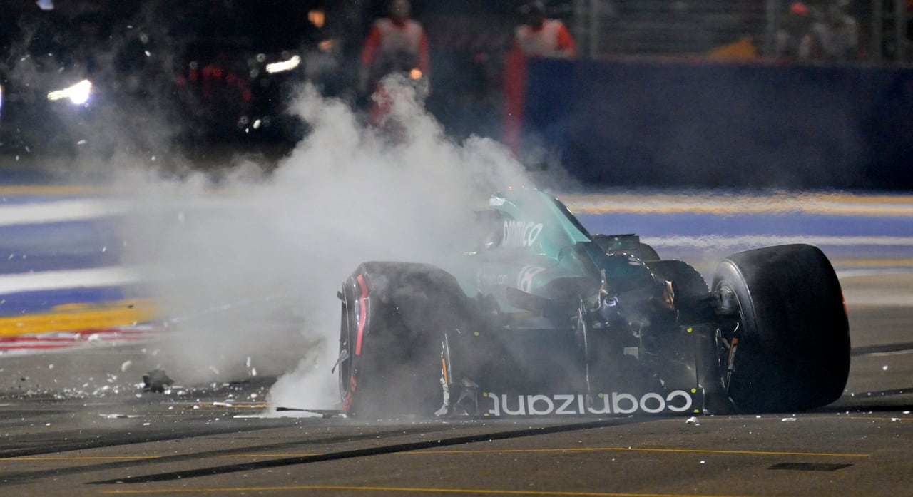 A smashed up race car on the track