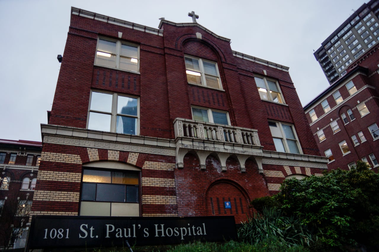 A large brick building with the words 'St. Paul's Hospital' below it.