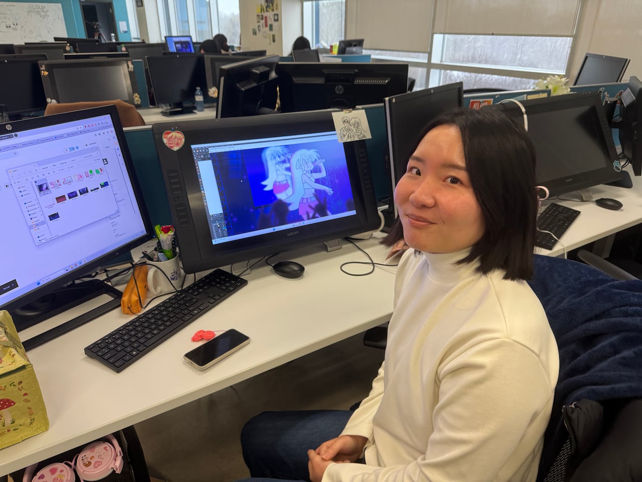 Woman sitting in front of computer