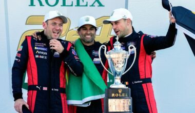 FILE - Porsche Penske Motorsport team members, from left to right, Britain