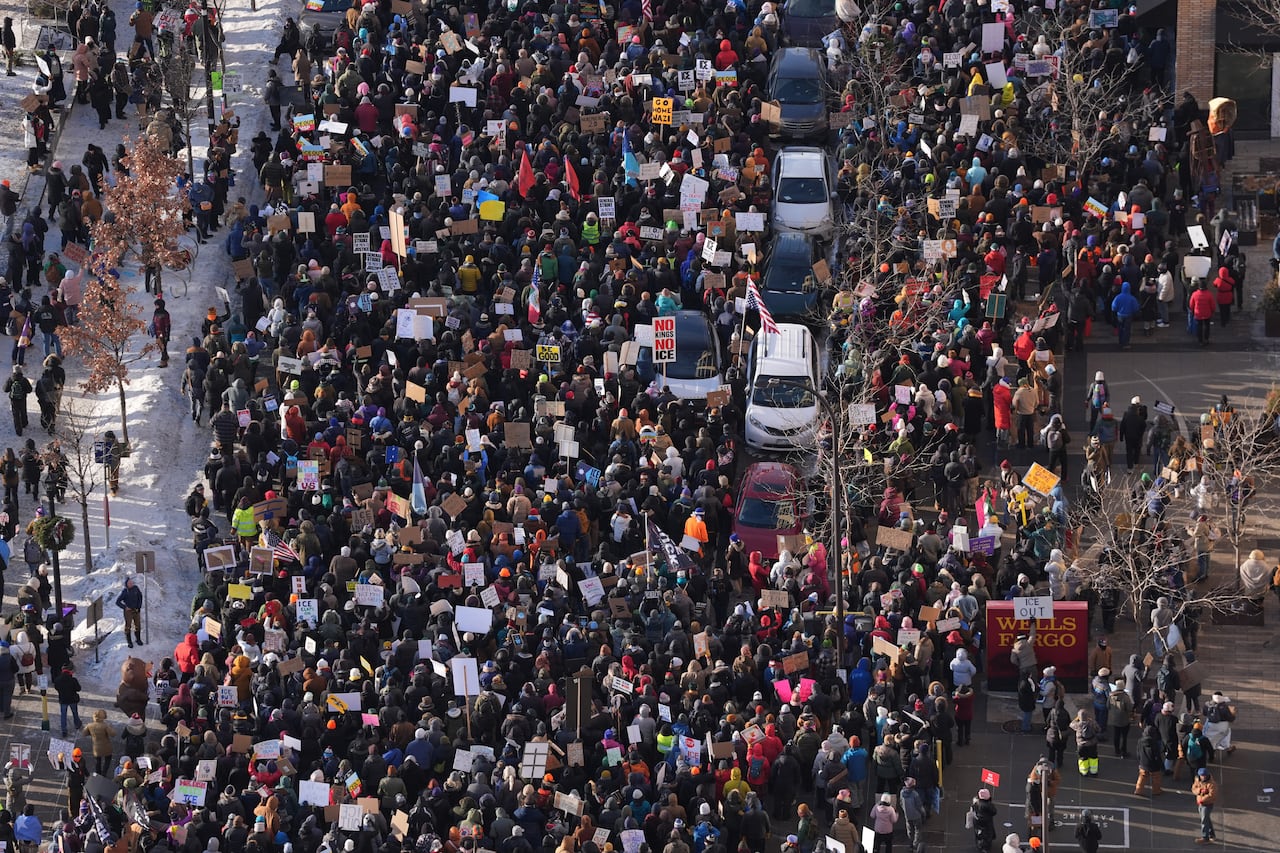 A large group of protesters, seen from above