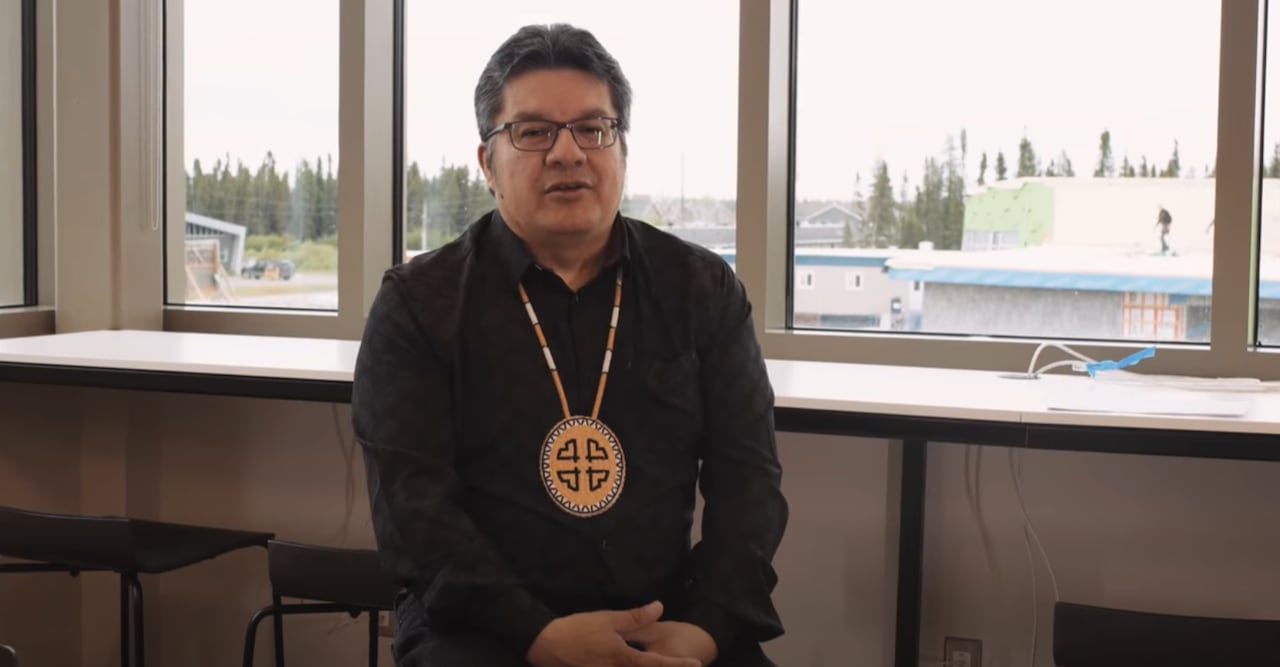 A man sitting in an office