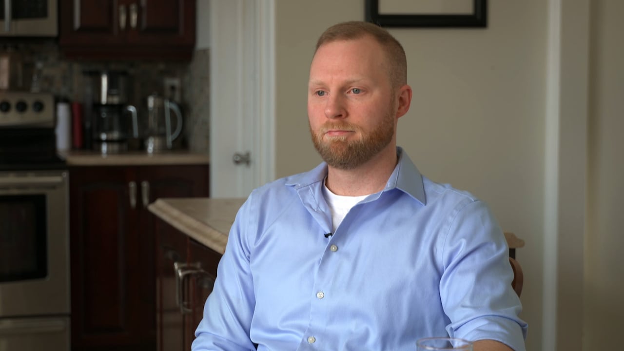 Man sitting in kitchen