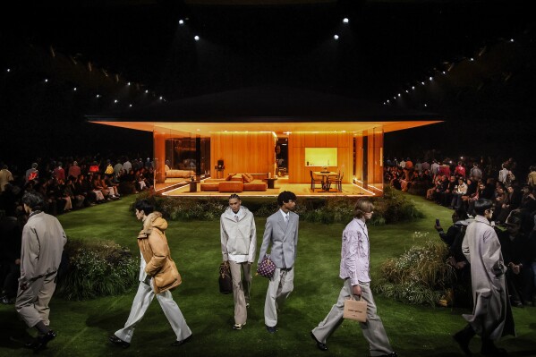 Models wear creations as part of the Louis Vuitton Fall/Winter 2026-2027 Men's collection presented in Paris, Tuesday, Jan. 20, 2026. (AP Photo/Thomas Padilla)