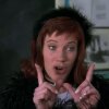 The 1995 teen movie Clueless popularized terms like "whatever" — including the gesture — shown here in a still featuring Elisa Donovan as Amber.