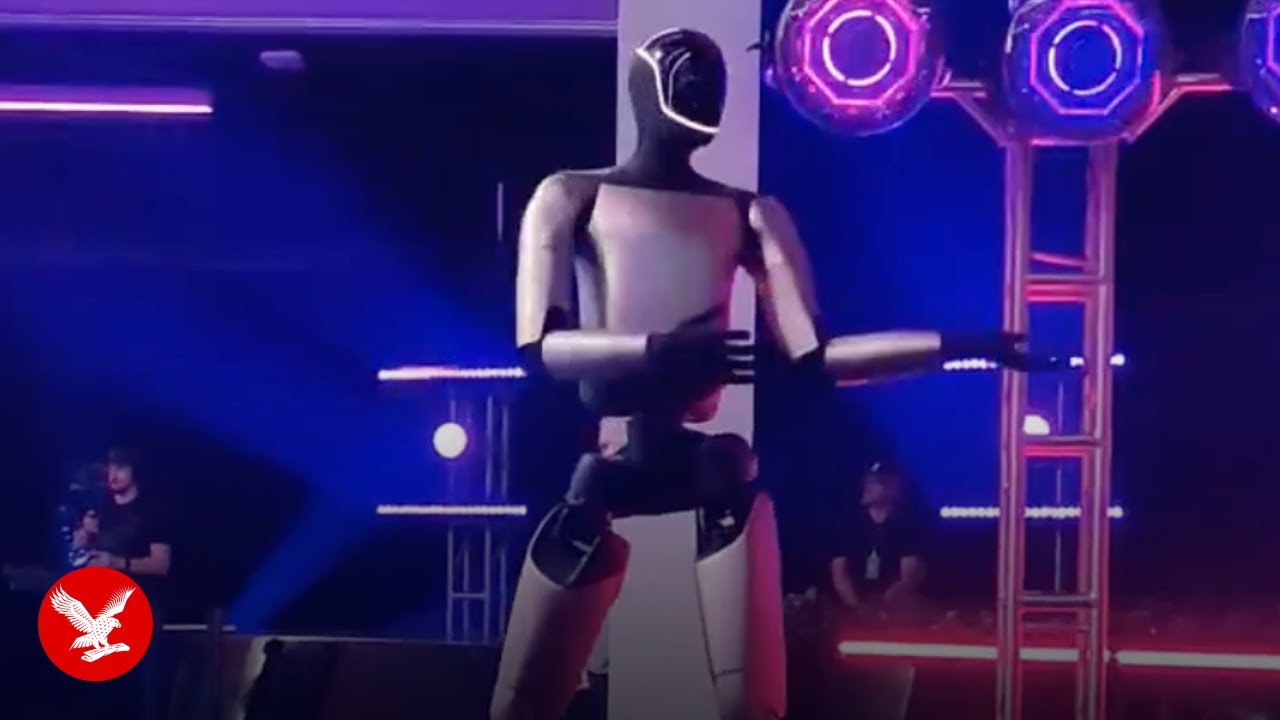 Tesla's Optimus robot shows off best dancing moves - YouTube
