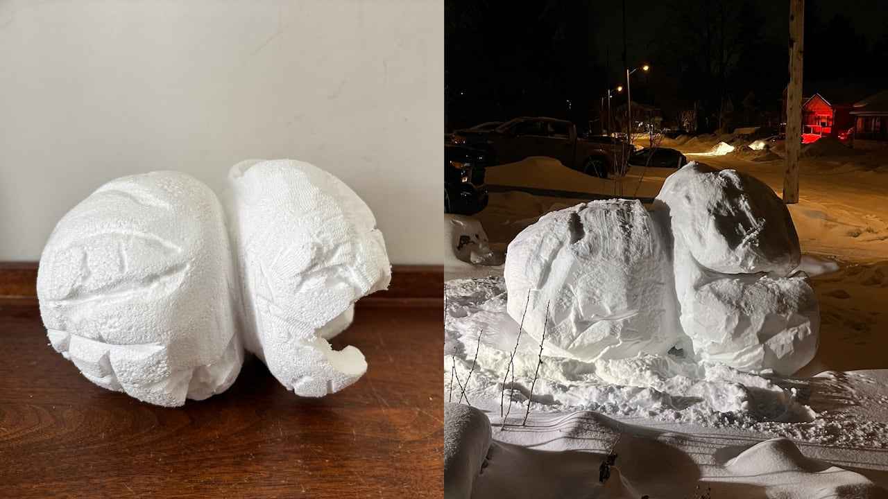 A small popcorn sculpture model displayed beside a larger popcorn-shaped snow sculpture outdoors.