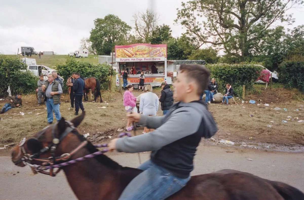 A traveller boy on a horse