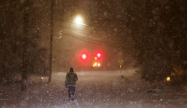 A man walks along an empty road during the pass of a polar vortex in Norwood, New Jersey