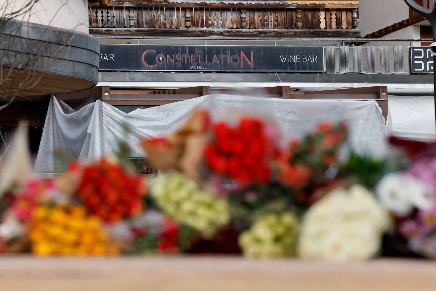 Flowers laid near Le Constellation bar in the ski resort of Crans-Montana in Switzerland on Saturday.