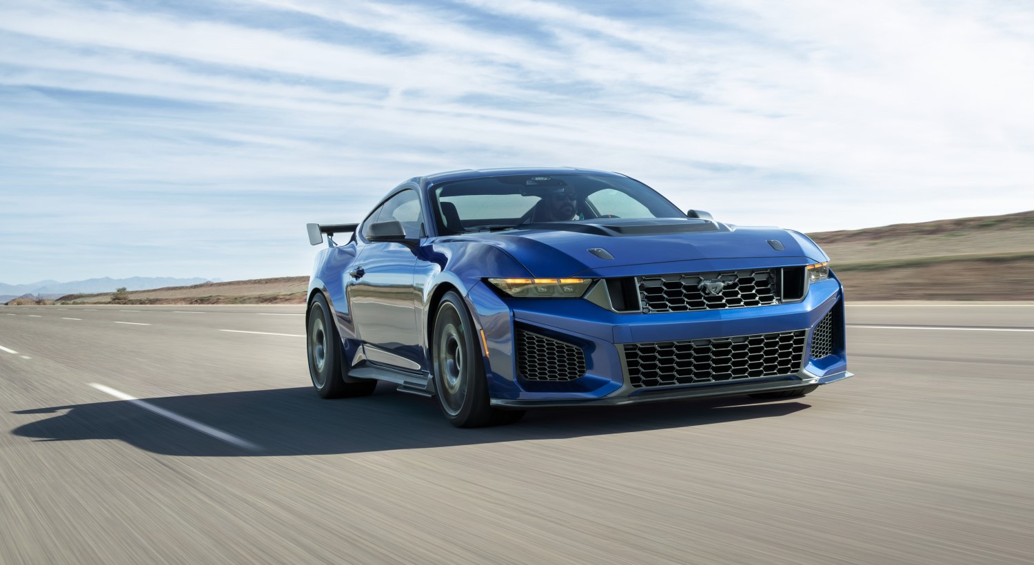 2026 Mustang Dark Horse SC. Prototype vehicle shown. Actual production vehicle may vary. Available summer 2026. Image supplied by Ford