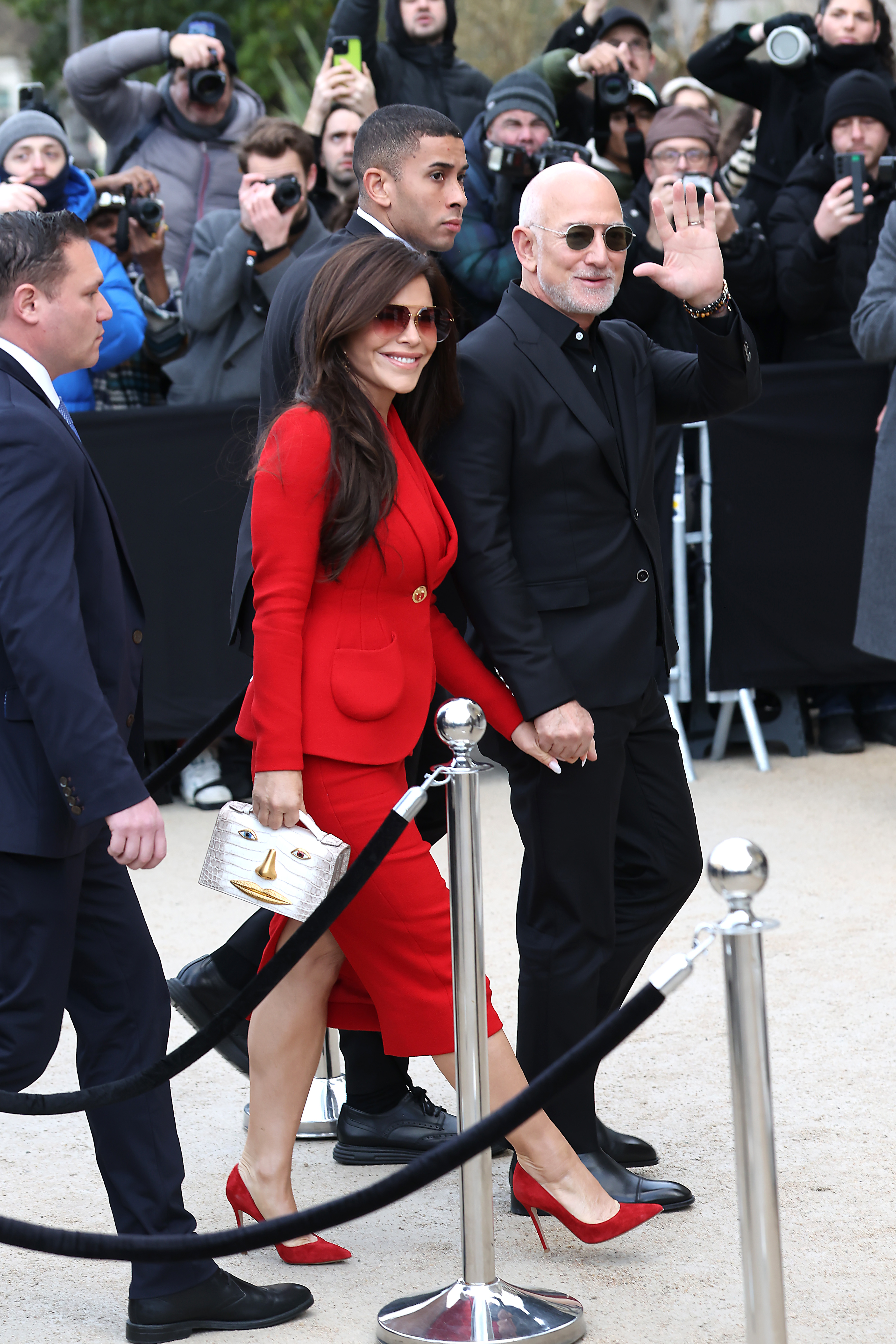 Lauren Sánchez and Jeff Bezos attend the Schiaparelli Haute Couture show during Paris Fashion Week.